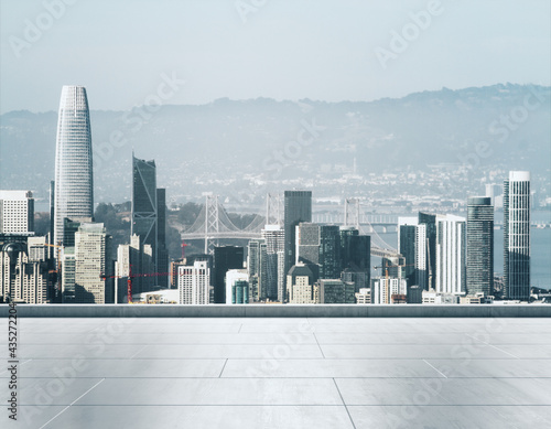 Empty concrete rooftop on the background of a beautiful San Francisco city skyline at sunset  mock up