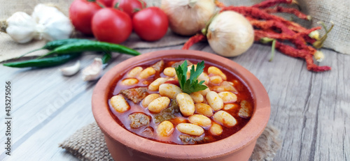 Delicious tomato sauce bean casserole.