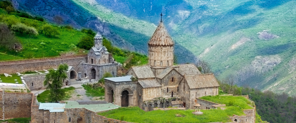 Ancient monastery in setting sun. Tatev. Armenia Ancient monastery in setting sun. Tatev. Armenia