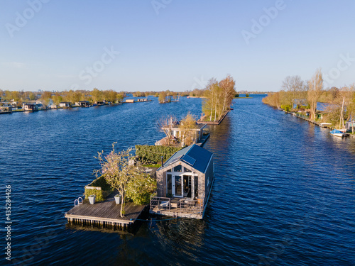 Aerial view of small islands in the Lake Vinkeveense Plassen, near Vinkeveen, Holland. It is a beautiful nature area for recreation in the Netherlands. Vinkeveen is mainly famous for the Vinkeveense photo