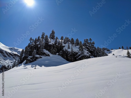 beautiful winter landscape in the mountains above davsos klosters at the fluela pass. Ski tour on the sentisch horn photo