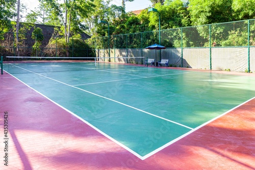 New concrete tennis courts available. With the morning sun © torsakarin