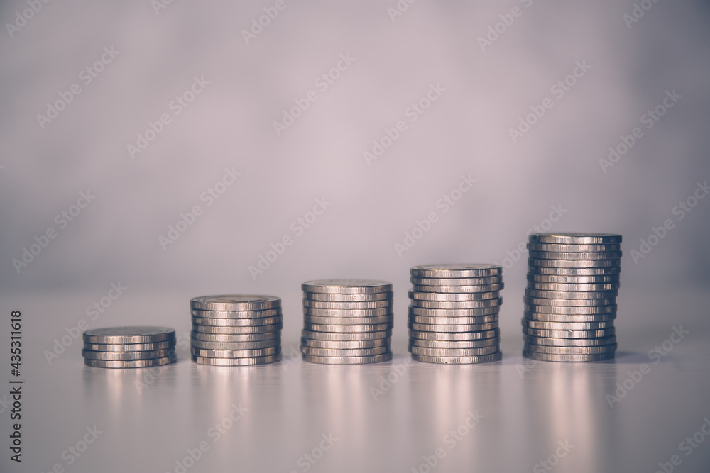 Coin stack with increase growth, finance and saving, investment for profit and success, planning with financial, growing economy and fund, stock and income, loan and insurance, business concept. Coin stack with increase growth, finance and saving, investment for profit and success, planning with financial, growing economy and fund, stock and income, loan and insurance, business concept.