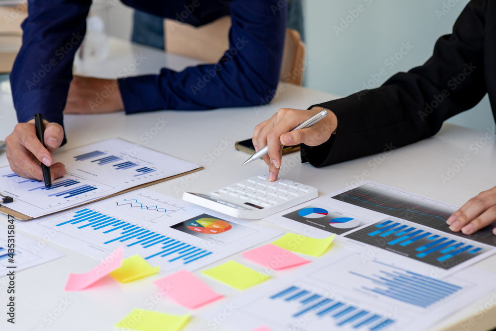Team of business people working together in the meeting room office, teamwork background charts and graphs banner, double exposure successful teamwork,business planning concept. Team of business people working together in the meeting room office, teamwork background charts and graphs banner, double exposure successful teamwork,business planning concept.
