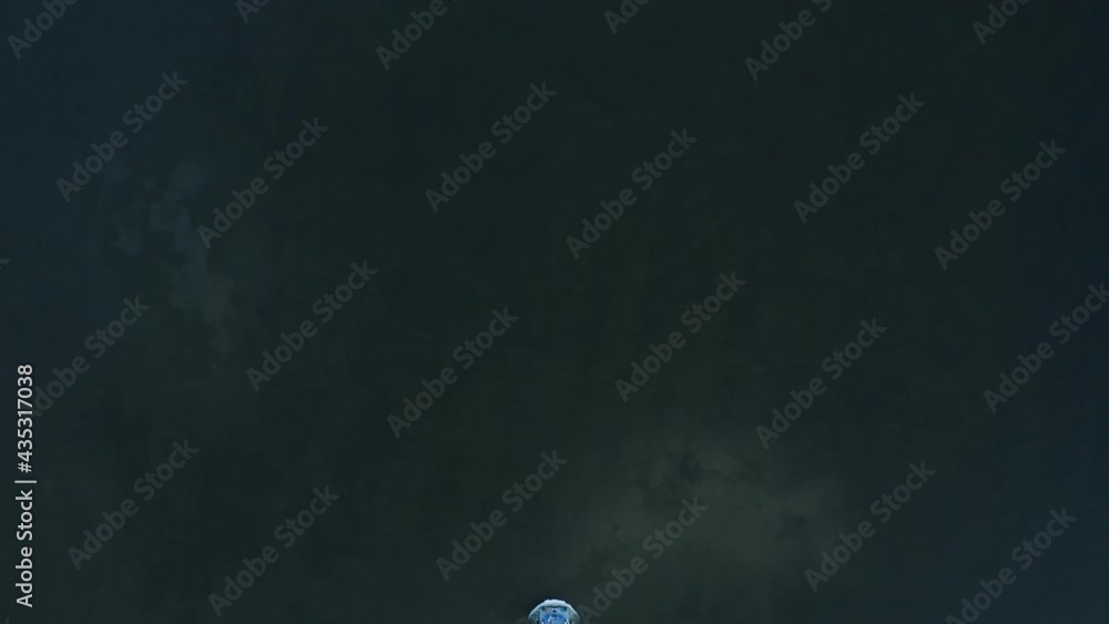 Bird's Eye View Of A Freighter Navigating The Waters Of Danube River In Croatia. aerial Bird's Eye View Of A Freighter Navigating The Waters Of Danube River In Croatia. aerial