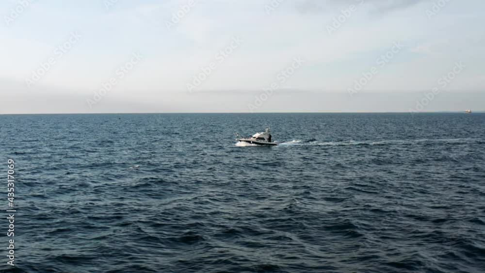 Motorboat At Blue Ocean Fishing For Tuna In Adriatic Sea At Daytime. - Aerial Drone Shot Motorboat At Blue Ocean Fishing For Tuna In Adriatic Sea At Daytime. - Aerial Drone Shot