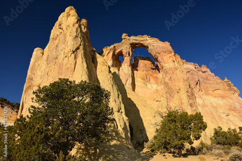 the towering double sandstone grosvenor arch along cottonwood canyon road  in  grand staircase escalante in southwestern utah, near cannonville photo