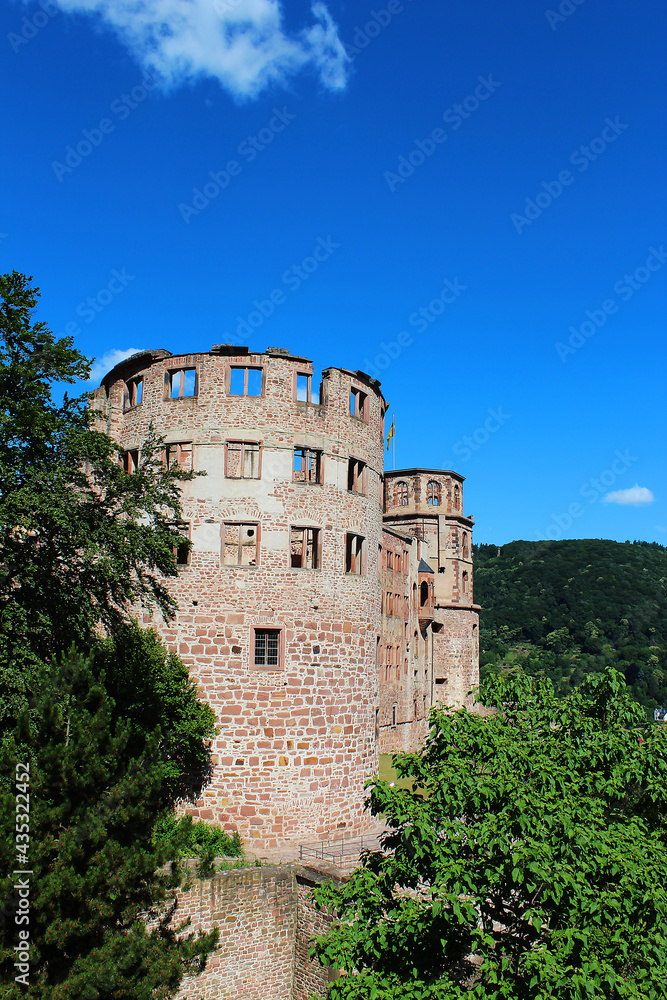 An old castle in Heidelberg, red and round in the woods
