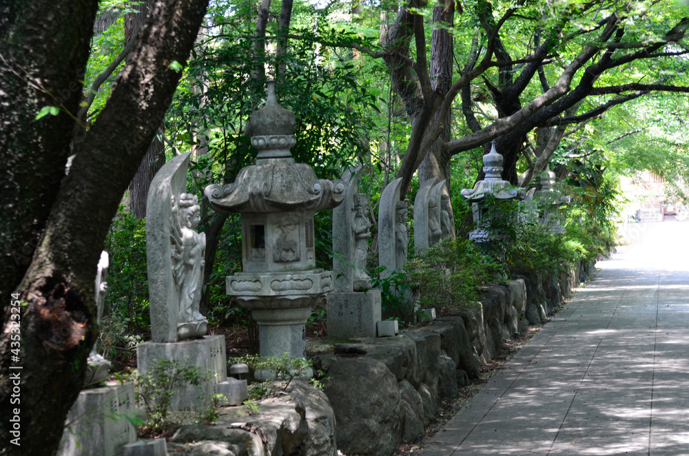 At the back of the path lined with stone lanterns and stone statues, there is a historic temple.