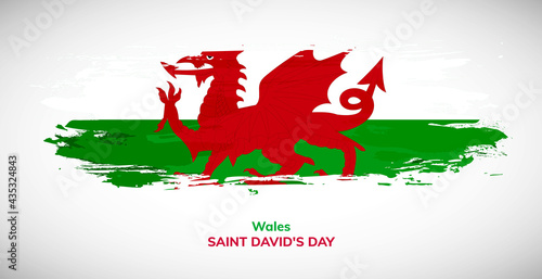 Happy saint davids day of Wales. Brush flag of Wales vector illustration. Abstract watercolor national flag background