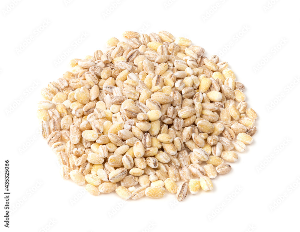pile of raw pearl barley groats closeup on white pile of raw pearl barley groats closeup on white