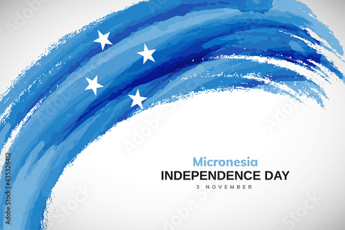 Happy independence day of Micronesia with watercolor brush stroke flag background with abstract watercolor grunge brush flag