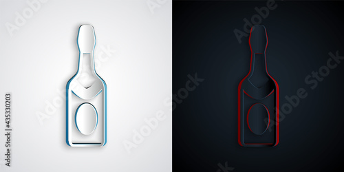 Paper cut Champagne bottle icon isolated on grey and black background. Paper art style. Vector