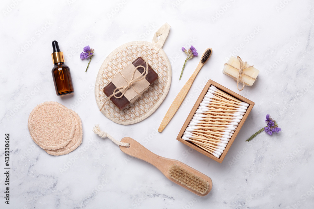 Bath tools on white marble background, top view, copy space. Daily bodycare concept, natural bath products Bath tools on white marble background, top view, copy space. Daily bodycare concept, natural bath products
