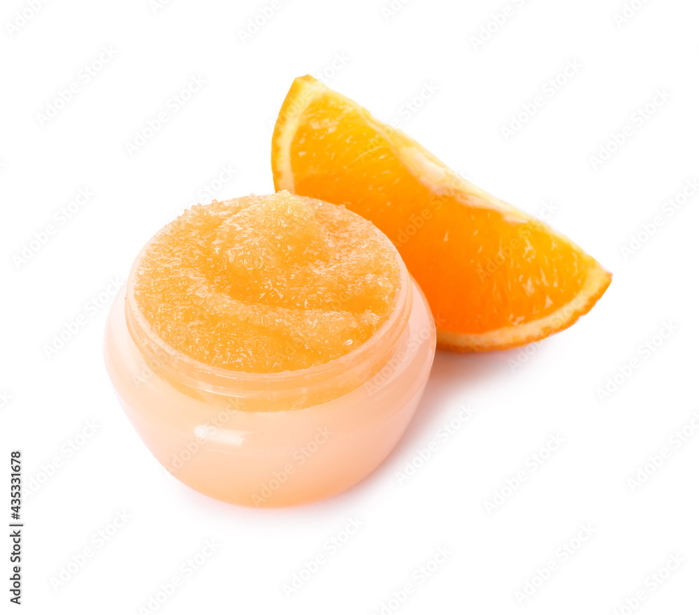 Jar with orange body scrub on white background Jar with orange body scrub on white background