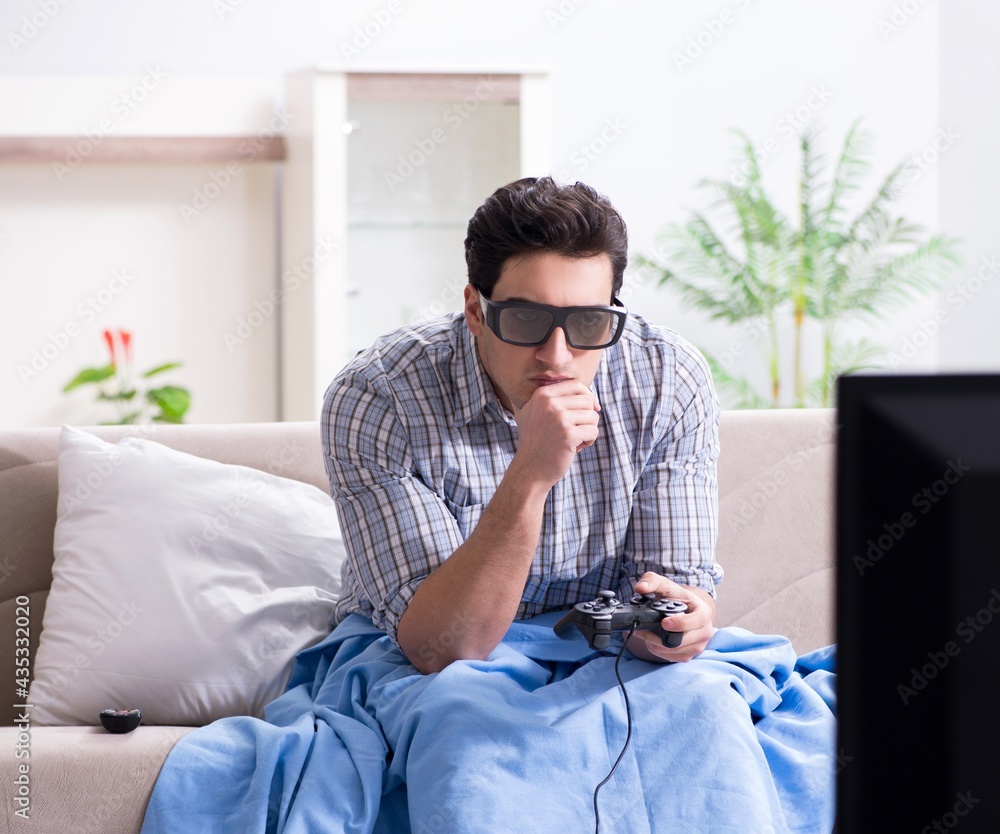 Man playing 3d games at home Man playing 3d games at home