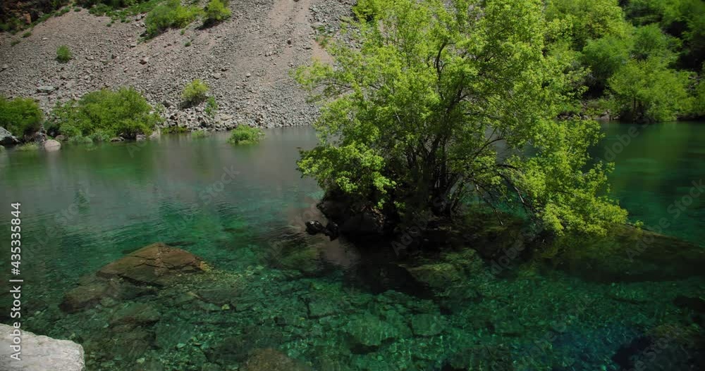 Small Mountain Lake of blue color Urungach. Located in Uzbekistan, Central Asia. 1 out of 10 Small Mountain Lake of blue color Urungach. Located in Uzbekistan, Central Asia. 1 out of 10