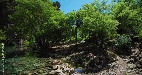 Small Mountain Lake of  blue color Urungach. Located in Uzbekistan, Central Asia. 3 out of 10 photo