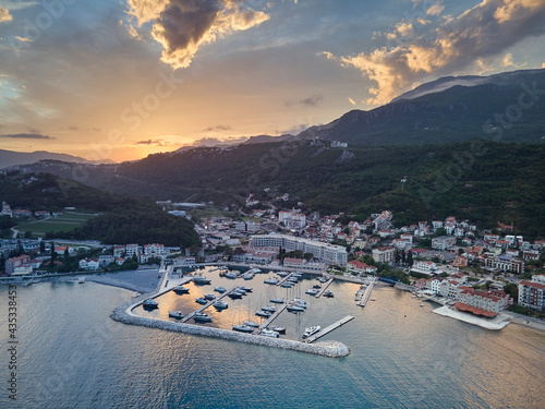 Aerial panoramic view of the Bay of Kotor, Herceg Novi, Montenegro, with the mountains at sunset photo