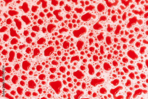 bloody drops on a white background texture. bubbles in red water