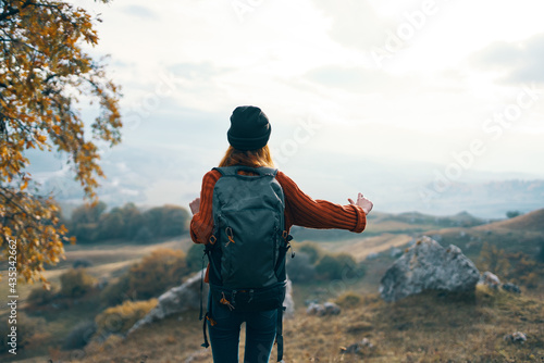woman hiker backpack mountains landscape vacation fun