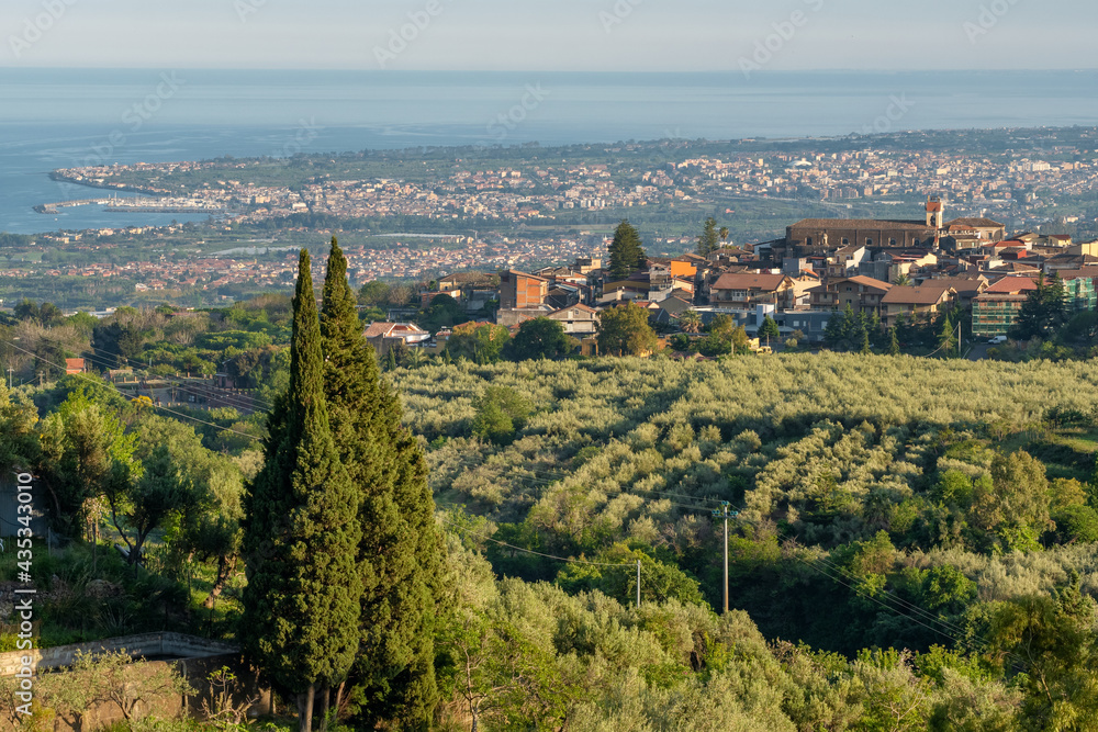 Beautiful sicilian landscape with Piedimonte Etneo town, Italy