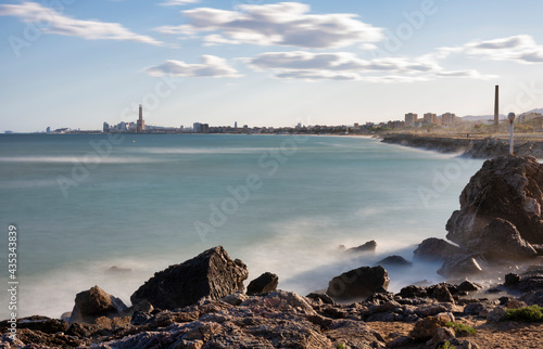 Long exposure landscape photography of the city of Barcelona from the beach