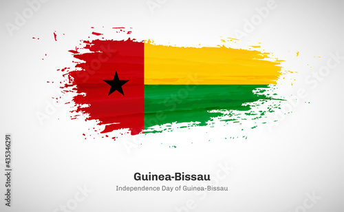 Creative happy independence day of Guinea-Bissau country with grungy watercolor country flag background