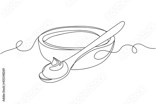 Continuous one line of sour cream in bowl and spoon in silhouette. Linear stylized.Minimalist.
