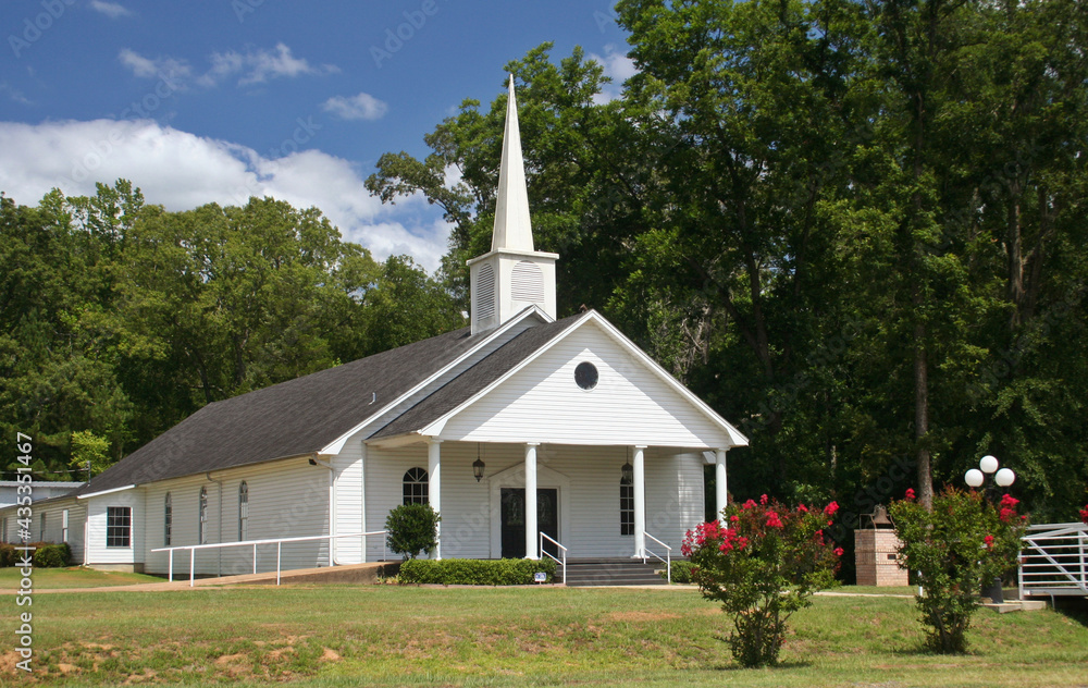 Small Rural Church With Blue Sky and Trees Small Rural Church With Blue Sky and Trees