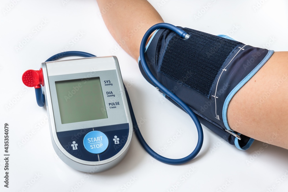 Blood pressure monitor with blank screen isolated on white Blood pressure monitor with blank screen isolated on white