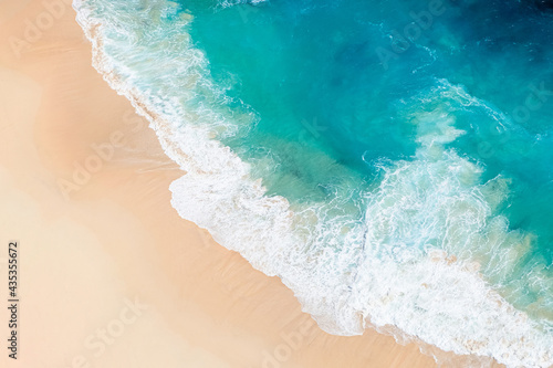 Beach and waves from top view.