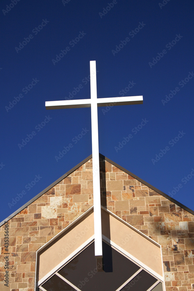 Small Church with Large Cross and Blue Sky