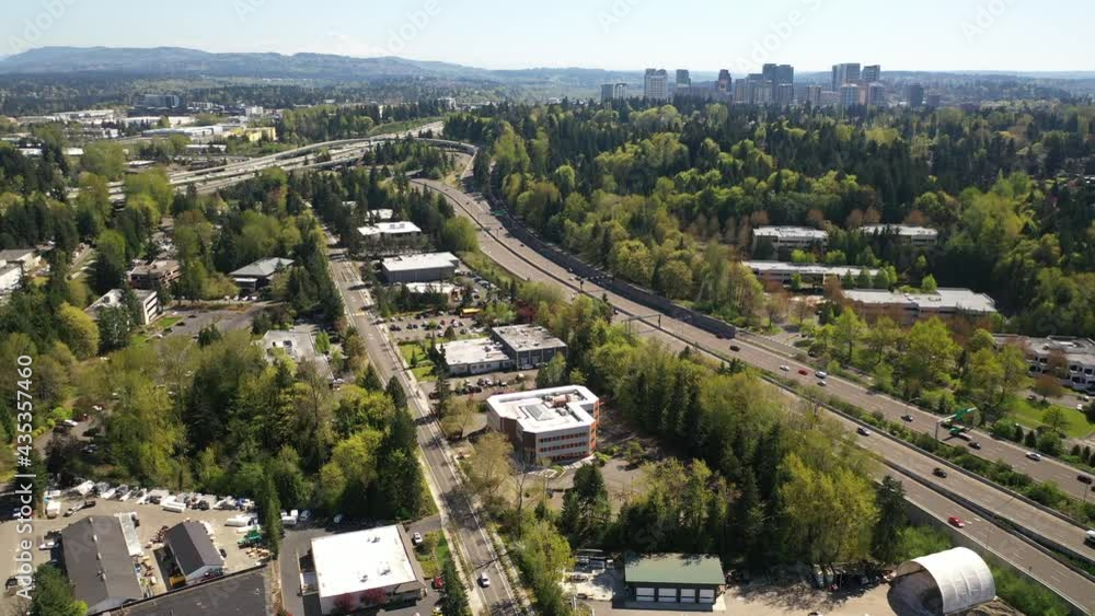 Cinematic 4K aerial drone shot of the freeway exchange at Lakeview, Central Houghton, Yarrow Bay, residential neighborhoods near Bellevue and Seattle, King County, Washington Cinematic 4K aerial drone shot of the freeway exchange at Lakeview, Central Houghton, Yarrow Bay, residential neighborhoods near Bellevue and Seattle, King County, Washington