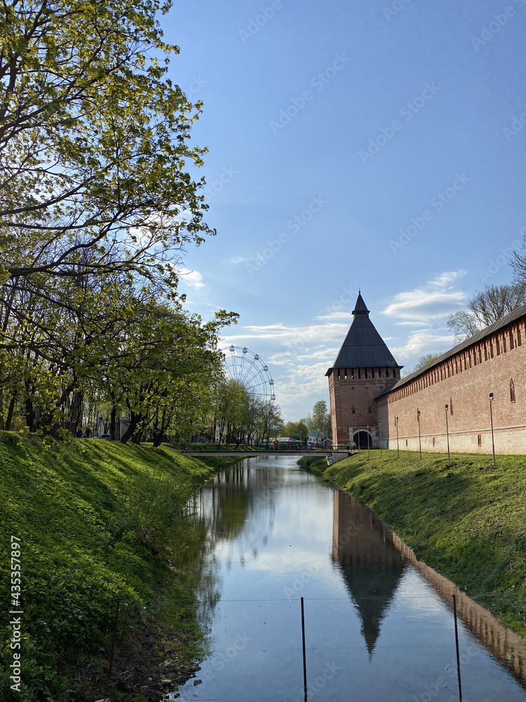 Naklejka premium The historic city center of Smolensk, Russia. Old castle wall of Kremlin in Smolensk 2021. Sunny spring day