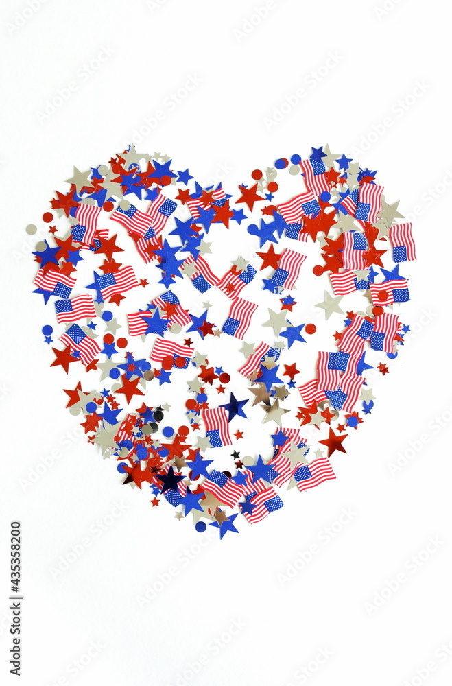 4th of July USA Independence Day confetti heart decorations american flag colors top view isolated.  Celebration memorial day in America.