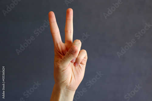 
close-up of the world gesture