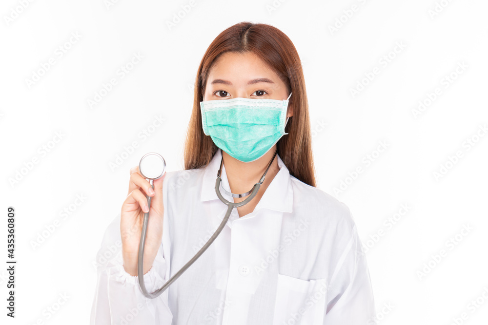 Young Asian female doctor on white background. Casual Asian woman wearing surgical mask, corona virus (Covid-19) prevention. Casual Asian woman wearing doctor gown on white background. Young Asian female doctor on white background. Casual Asian woman wearing surgical mask, corona virus (Covid-19) prevention. Casual Asian woman wearing doctor gown on white background.