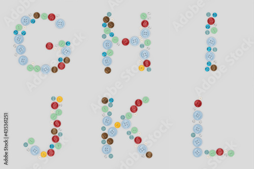 Alphabet from sewing buttons . Letter from buttons. Font from buttons. On a white background. 3D © vladst1969_1