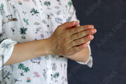 
women's hands in the om prayer