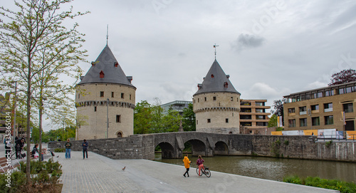 
The medieval Broel Towers (Broeltorens) in Courtrai (Kortrijk) and Broelbridge 
on the river Leie, West Flanders, Belgium photo