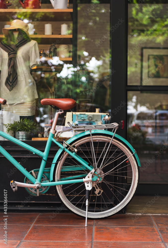 Bicycle at a coffee shop in the city