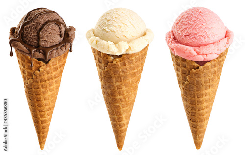 Ice cream scoops in cones with chocolate, vanilla and strawberry isolated on white background.