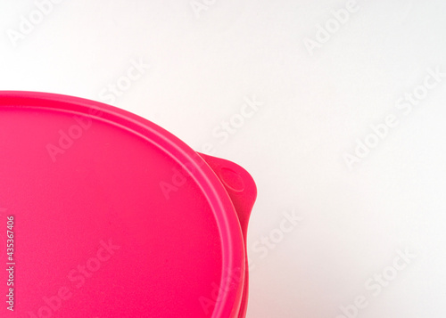 Red of plastic container isolated on white background.