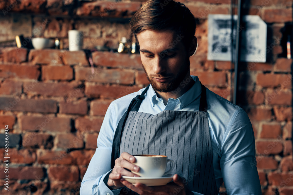 male waiter service a cup of coffee ordering professional