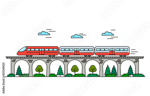 a high-speed train with carriages rides on the bridge against the backdrop of trees and bushes.