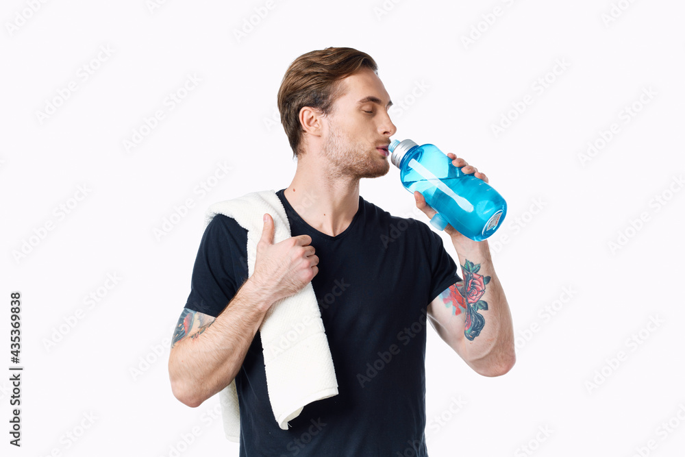 sporty man in black t-shirt workout water bottle sporty man in black t-shirt workout water bottle