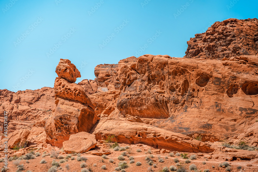 Valley of Fire National Park in Nevada. Orange amazing landscape, stones of different shapes and a fire wave Valley of Fire National Park in Nevada. Orange amazing landscape, stones of different shapes and a fire wave