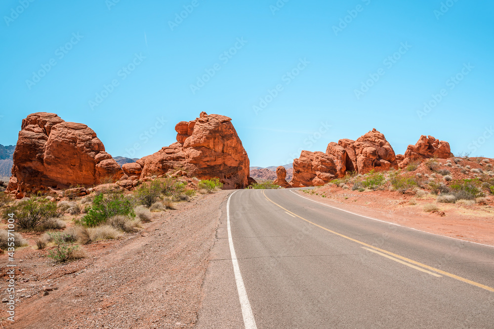 Valley of Fire National Park in Nevada. Orange amazing landscape, stones of different shapes and a fire wave Valley of Fire National Park in Nevada. Orange amazing landscape, stones of different shapes and a fire wave