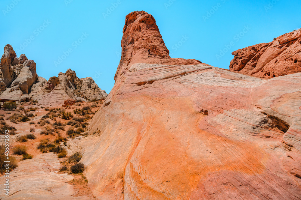 Valley of Fire National Park in Nevada. Orange amazing landscape, stones of different shapes and a fire wave